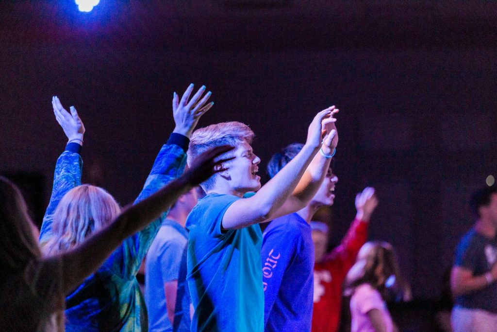 a group of people standing next to each other